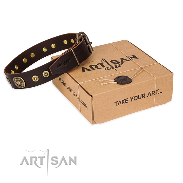Genuine leather dog collar made of soft to touch material with corrosion resistant traditional buckle
